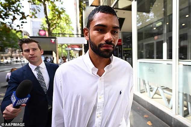 The 23-year-old (pictured outside a pitch in Melbourne last year) will not be able to play any form of footy during his monstrous suspension