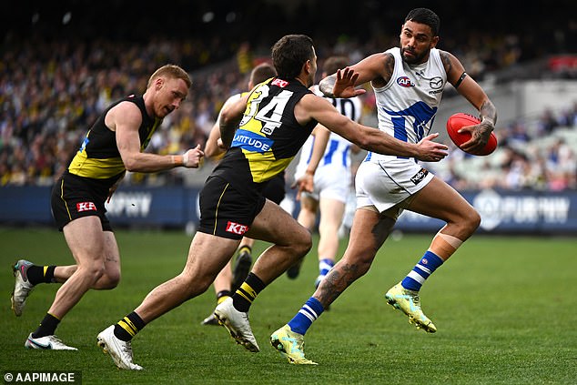 Thomas (pictured last year fending off a tackler against Richmond) was sent to the VFL as punishment during the 2023 season