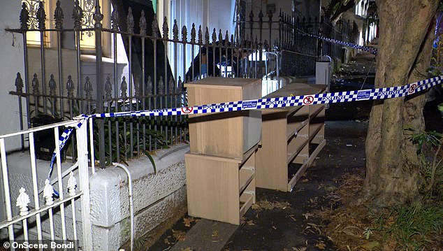 Neighbors said police had removed furniture and rolled up carpet from the house yesterday