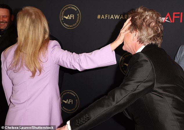 Days later, at the AFI Awards luncheon, Meryl playfully put her hand on Martin's face on the red carpet – as if to playfully push him away;  at the AFI Awards Luncheon on January 12