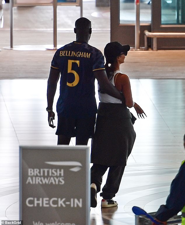 Stormzy was seen putting his arm around Maya's waist as they strolled through the airport