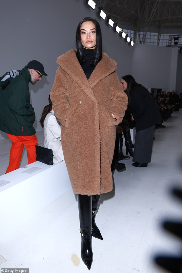 The Australian model, 33, stepped out for the show in Italy on Thursday wearing a huge brown teddy coat from the fashion house, which retails for $5,200.