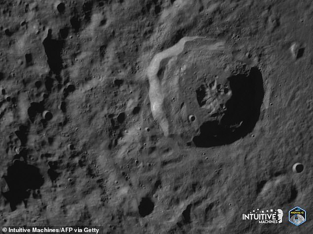 The six-legged robot lander touched down at 5:30 PM ET in a crater called Malapert A (pictured) near the moon's south pole