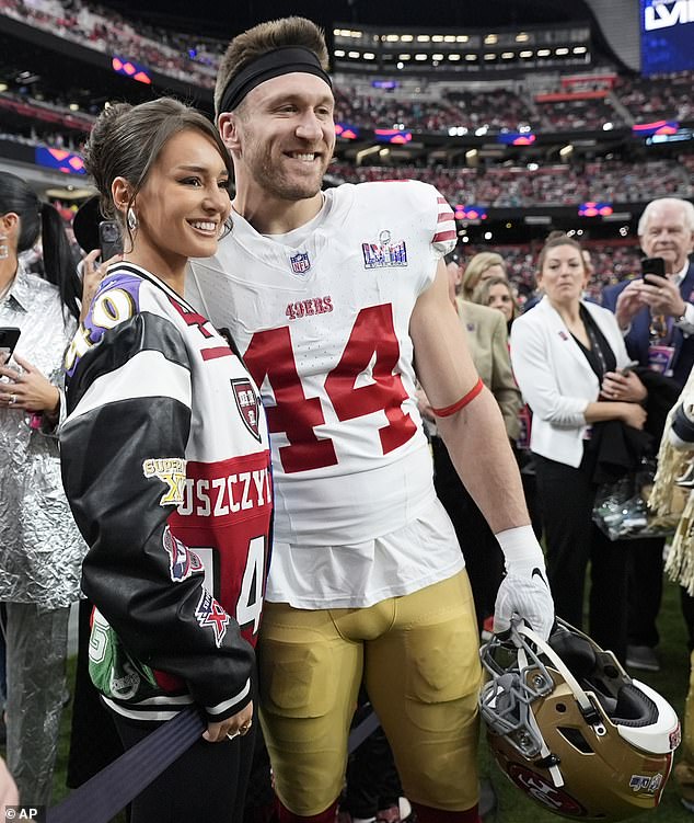 Kristin is the wife of 49ers fullback Kyle Juszczyk.  Pictured in custom 49ers fandom at Super Bowl LVIII in Las Vegas with her husband