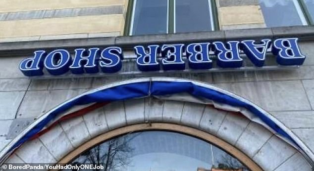 A barbershop ordered a shiny new blue sign for their store, but somehow managed to hang it upside down