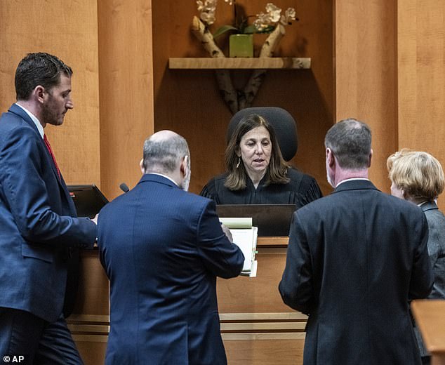 Superior Court Judge Amy Messer talks to attorneys during Adam Montgomery's trial Thursday in Hillsborough County Superior Court