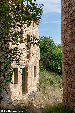 According to the real estate agent's listing on its website, the village church, bell tower and rectory are still standing