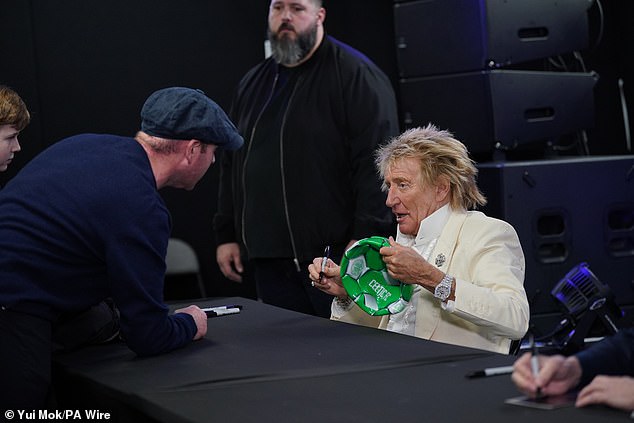 Sir Rod and Jools appeared in high spirits as they signed copies of their new album Swing Fever at HMV in London's Oxford Street