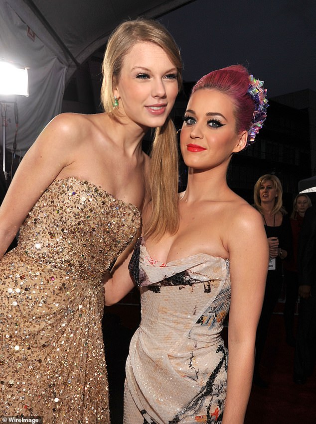 Taylor and Katy pictured together at the 2011 American Music Awards, a few years before their feud