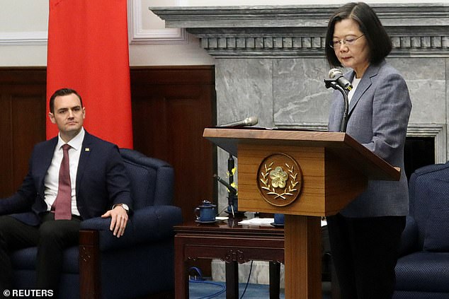 Taiwanese President Tsai Ing-wen speaks during a meeting with US Representative Mike Gallagher