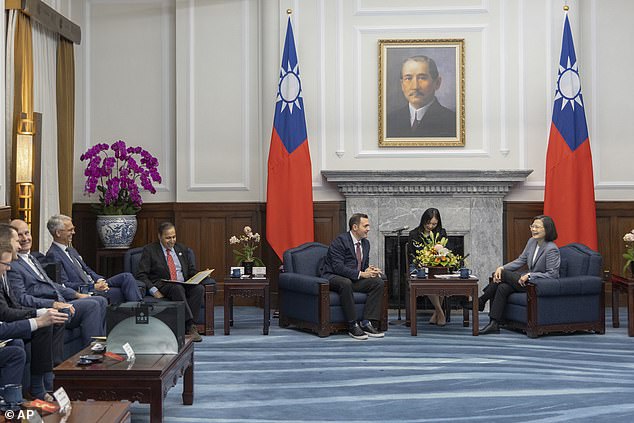 Taiwanese President Tsai Ing-wen, right, talks with Representative Mike Gallagher, the Republican chairman of the House Select Committee on the Chinese Communist Party, center