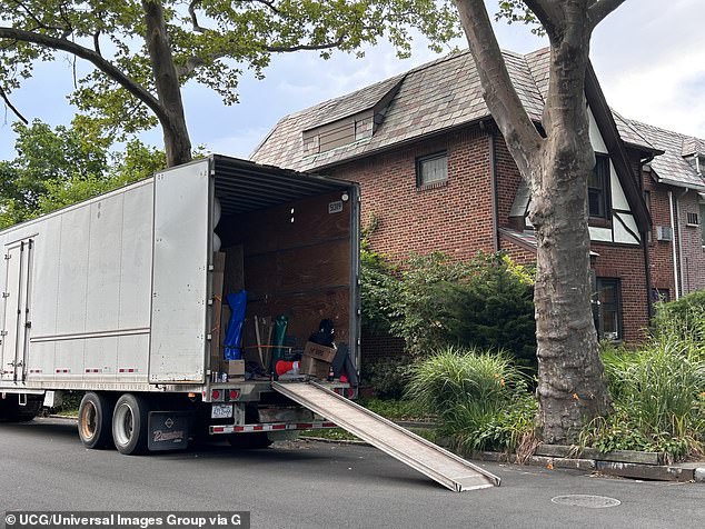 A moving van outside a home in Queens, New York City (file photo)