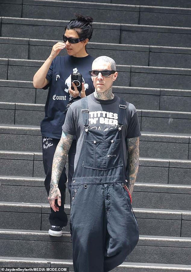 She paired her all-black ensemble with black sneakers, sunglasses and a small black handbag