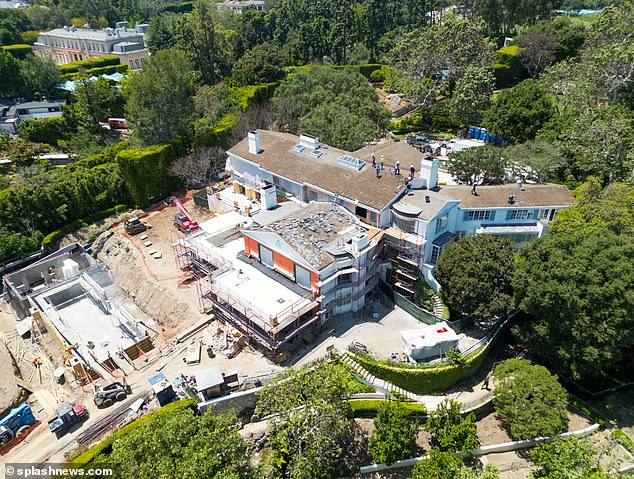 Exclusive photos from DailyMail.com show construction resumed on Jeff Bezos' massive Beverly Hills estate in May 2023