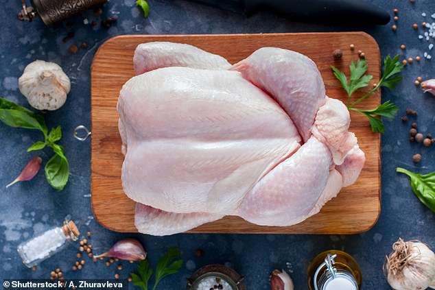 The USDA recommends cooking whole poultry to a safe minimum internal temperature of 165F, as measured with a food thermometer (stock image)