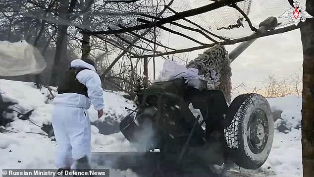 Russian D-30 howitzer crews target their Ukrainian enemies in Kupiansk, in a war that has alarmed NATO members along the Russian border