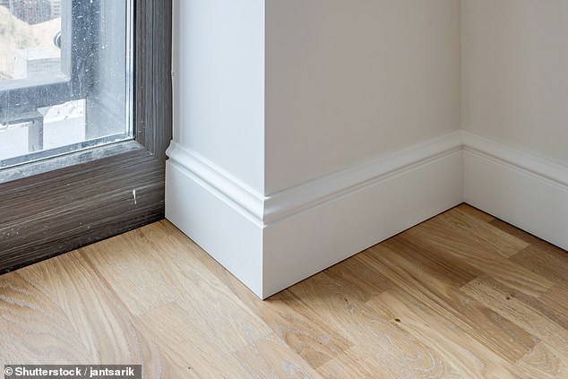 If you don't like scotia edges, you can slide the laminate under the baseboards to close any expansion joints.