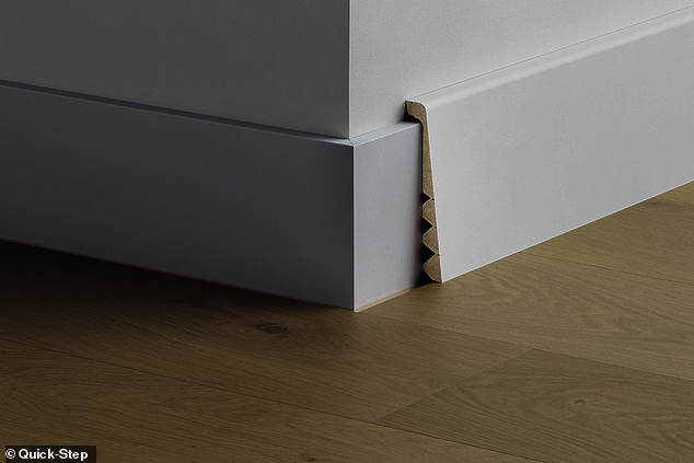 Another option offered by most laminate companies are baseboard covers, which can be height adjustable