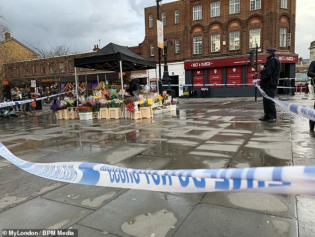 The cordon stretched past Stockwell tube station, along Clapham Road and Binfield Road and past Pret A Manger and Taste More.