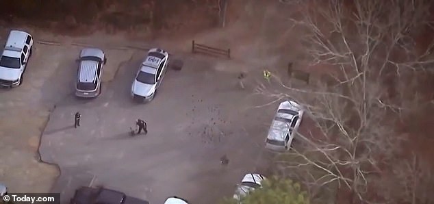 Police are searching a wooded area at the University of Georgia after Thursday's shock discovery