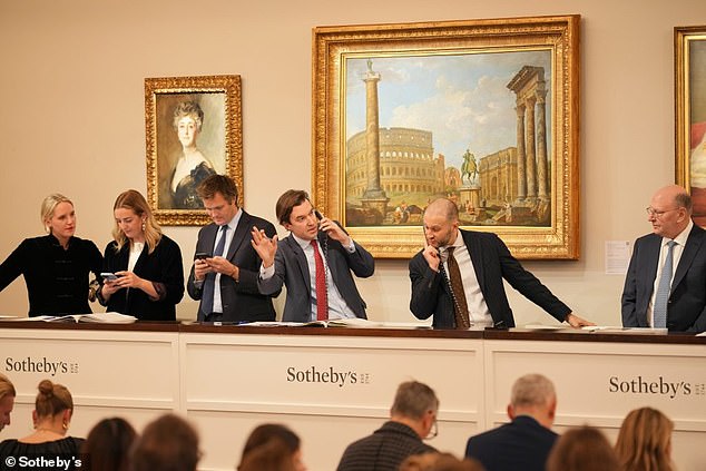 Sotheby's finally determined the work was a genuine Rembrandt at its December auction (pictured) last year, when the price rose to $13.8 million just two years after the last sale.