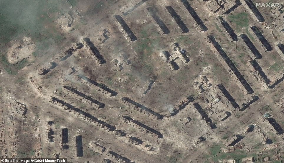 No.  12 and apartment buildings in the eastern city of Bakhmut, Donetsk Oblast, on May 15, 2023