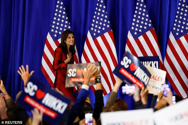 The Republican presidential candidate greets supporters as she arrives at her primary party in Charleston, South Carolina.  She told the crowd that the roughly 40 percent of votes she received in her home state was enough to advance