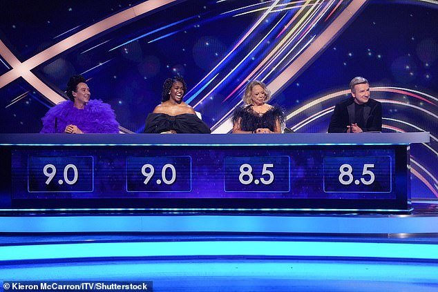 Oti (second from left) pictured with guest judge Johnny Weir and regulars Jayne Torvill and Christopher Dean on the set of Dancign on Ice