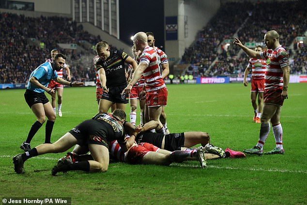 Wigan center Jake Wardle was awarded a controversial try in the 53rd minute