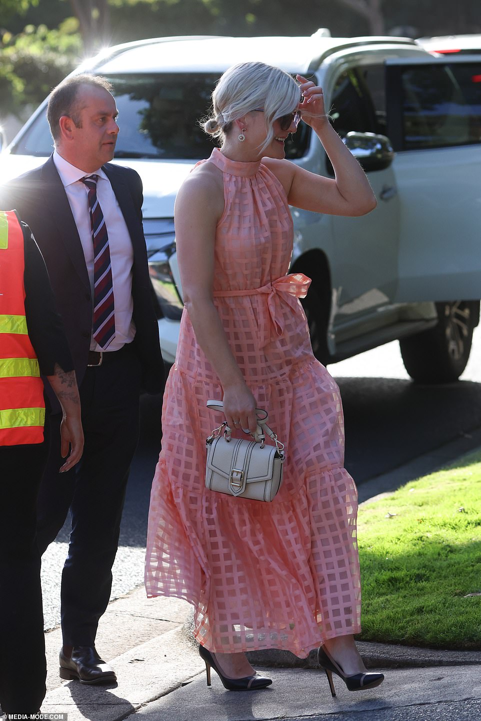 Melbourne artist DJ Femme was also on the bill at the $20 million mansion and said it was an incredible, amazing and stunning event.”  The woman pictured looks very happy to be attending the show