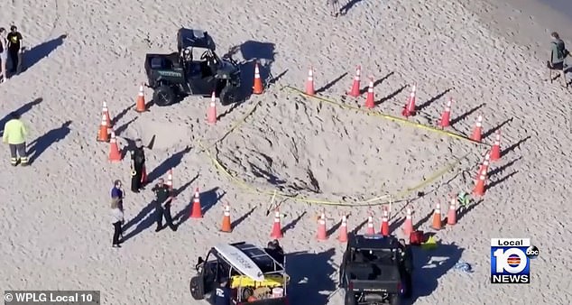 A witness to the tragedy said 'everyone is screaming' after the sand hole Sloan was playing in collapsed, before dozens of bystanders rushed to help dig her out