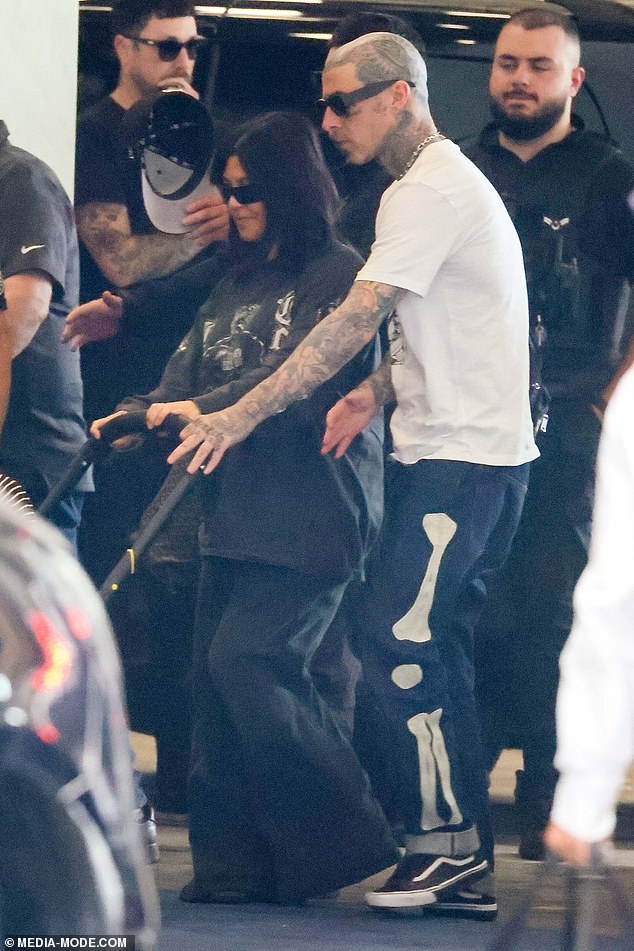 1708844903 994 Kourtney Kardashian and Travis Barker cut casual figures as they