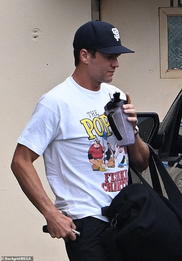 The 45-year-old, seven-time Super Bowl champion wore a black Giants cap and a Popeye t-shirt