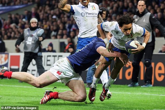 Ange Capuozzo scored Italy's try after half-time against some of his Toulouse teammates