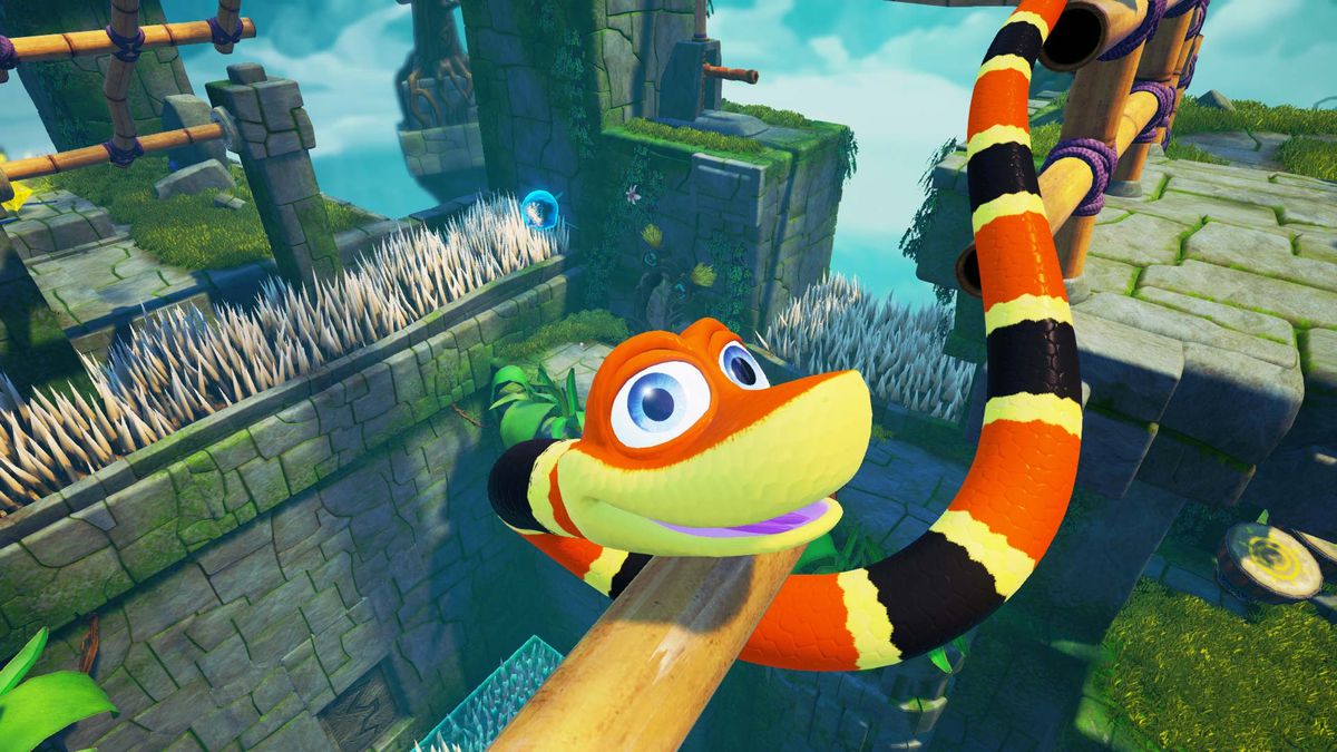 Noodle the Snake snakes around a bamboo structure over a pit of spikes in a screenshot from Snake Pass