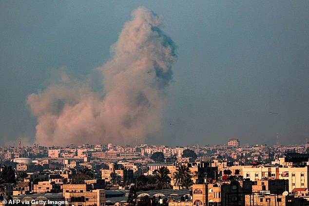 Smoke rises after the Israeli bombardment of Rafah in the southern Gaza Strip