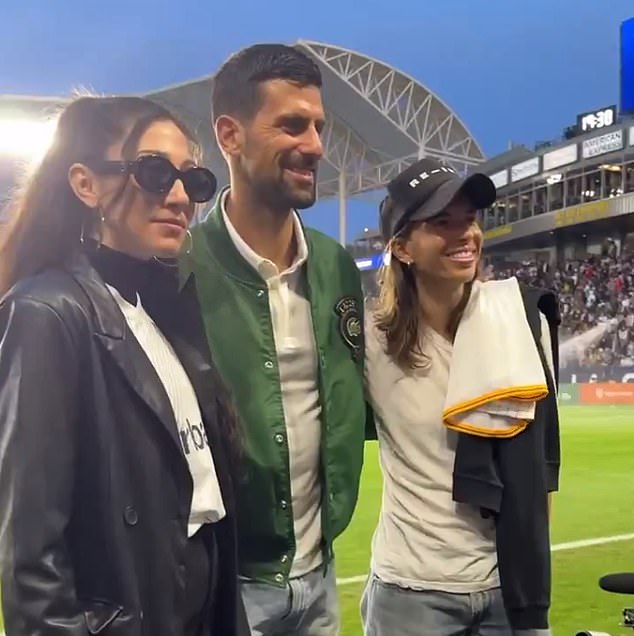 Novak Djokovic poses for a photo alongside USWNT stars Christen Press and Tobin Heath