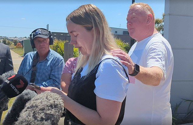 Mick Murphy comforts his daughter Jessica during his only press conference in the week after his wife disappeared