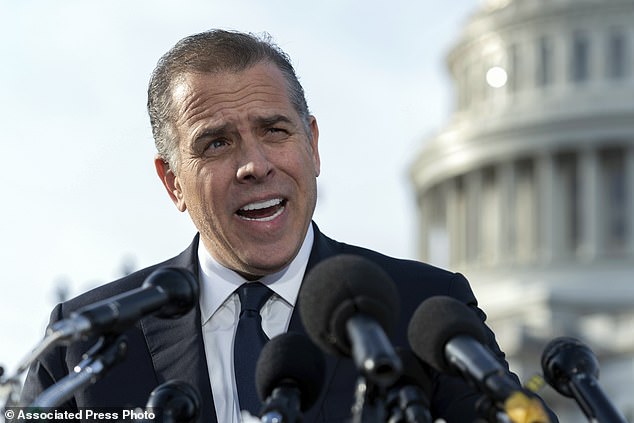 Hunter Biden, son of President Joe Biden, talks to reporters at the U.S. Capitol in Washington, December 2023