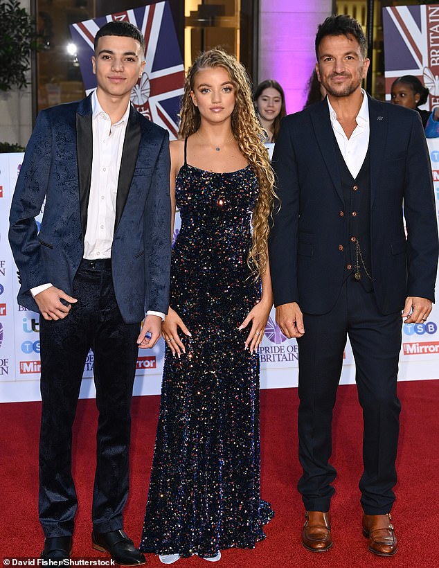 The mother of five shares Junior, 18, and Princess, 16, with Peter Andre, to whom she was married from 2005 to 2009 (Peter pictured with their children in 2022)