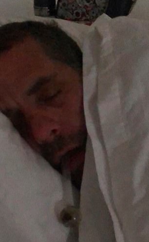 A photo of Hunter Biden's abandoned hard drive shows him passed out with a crack pipe sticking out of his mouth