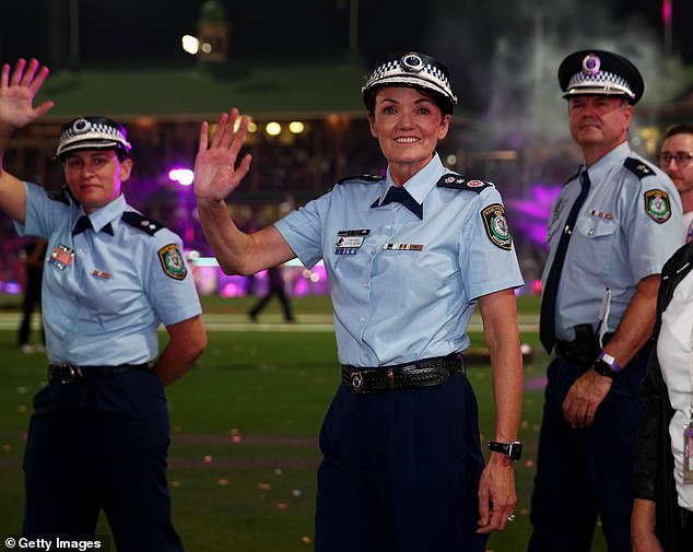 Commissioner Karen Webb (pictured center at Mardi Gras 2022) said the organizers' decision left her 