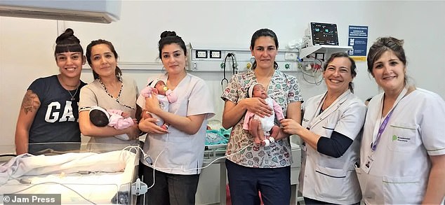 Pictured above is mother Melany (far left) and hospital staff with her three babies.  They were on oxygen for a few weeks before they were allowed to go home