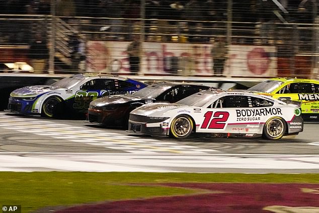 Daniel Suarez (99), left, defeated Kyle Busch (8), center, and Ryan Blaney (12) in Sunday's race