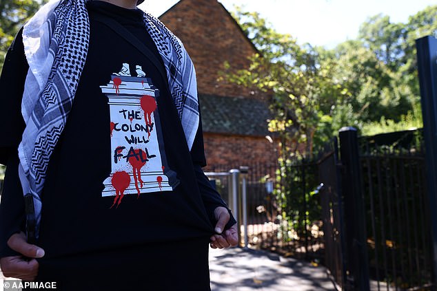 Other visitors arrived at the site wearing shirts depicting the statue of Captain Cook which had been sawed off at the ankles and similarly the phrase 'the colony will fall' had been spray-painted next to it.