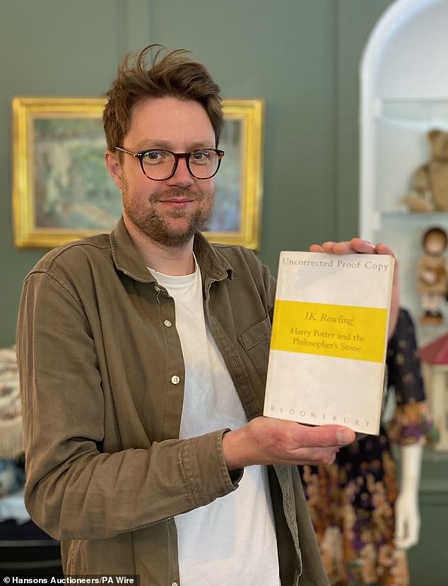 Jim Spencer, head of books at Hansons Auctioneers, with the Harry Potter novel in its first edition