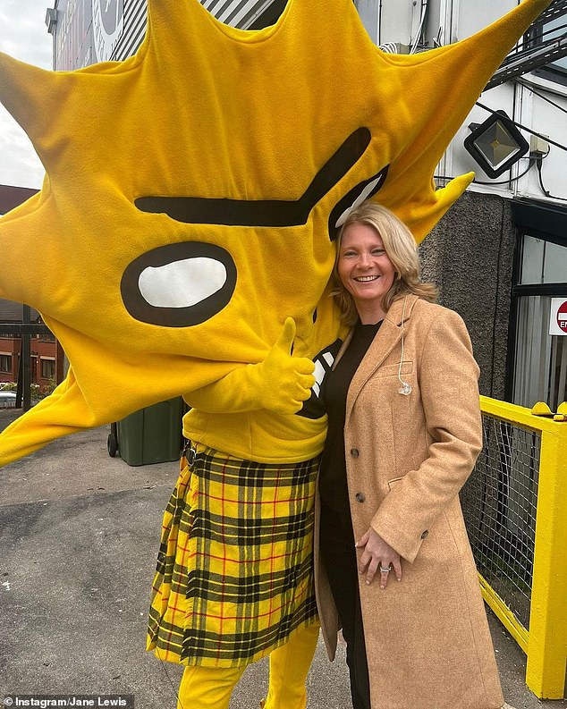 Veteran broadcaster Lewis pictured with Partick Thistle's unusual mascot Kingsley