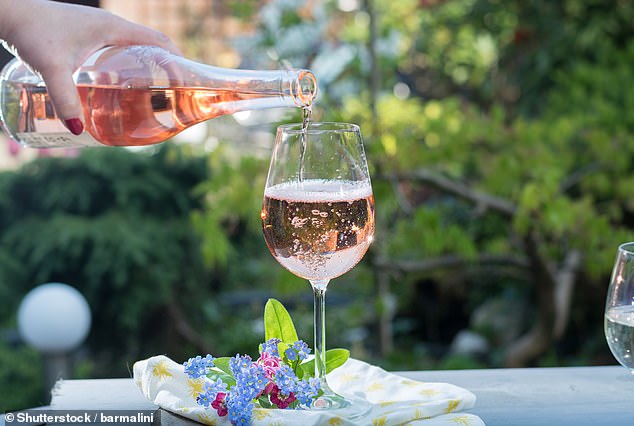Experts have revealed that when it comes to white or rosé wines, you should opt for varieties that come in dark bottles (stock image)