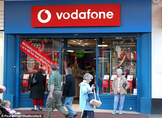 The first 3G voice call in Britain was made by Vodafone in April 2001, although the 3G mobile data network was in use until 2005.  Pictured: a Vodafone store in Bristol, 2003