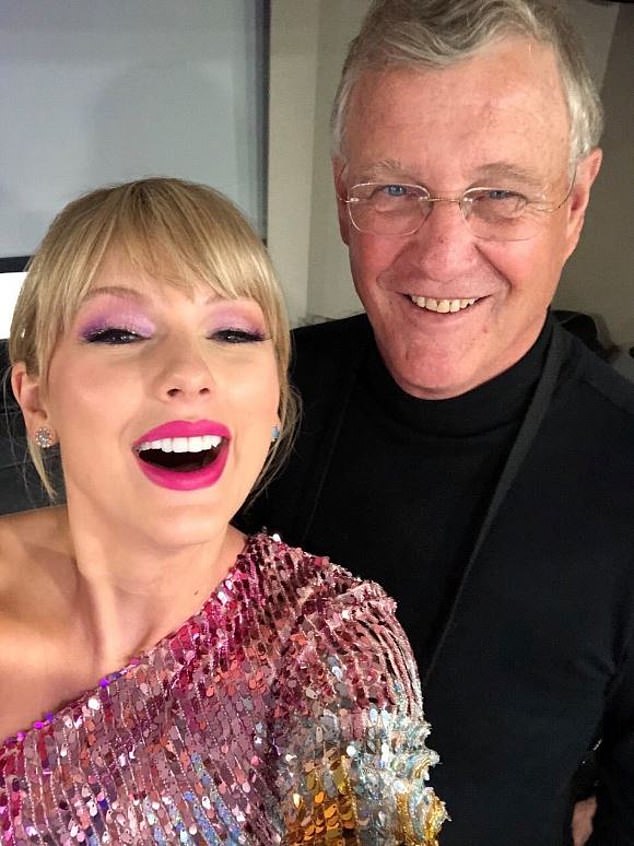 Taylor fled Australia after her father Scott was accused of attacking a local photographer on Tuesday morning (seen together)